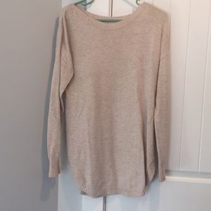 Tunic length sweater.
